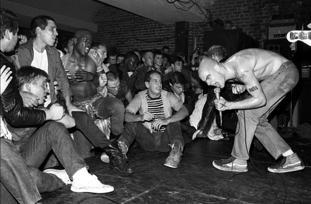 Henry Rollins performing for crowd as part of Black Flag